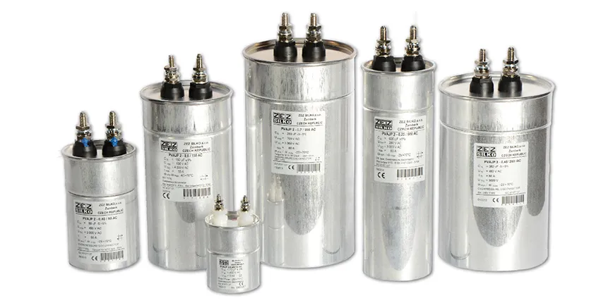 A cylindrical capacitor used in an air conditioning unit.