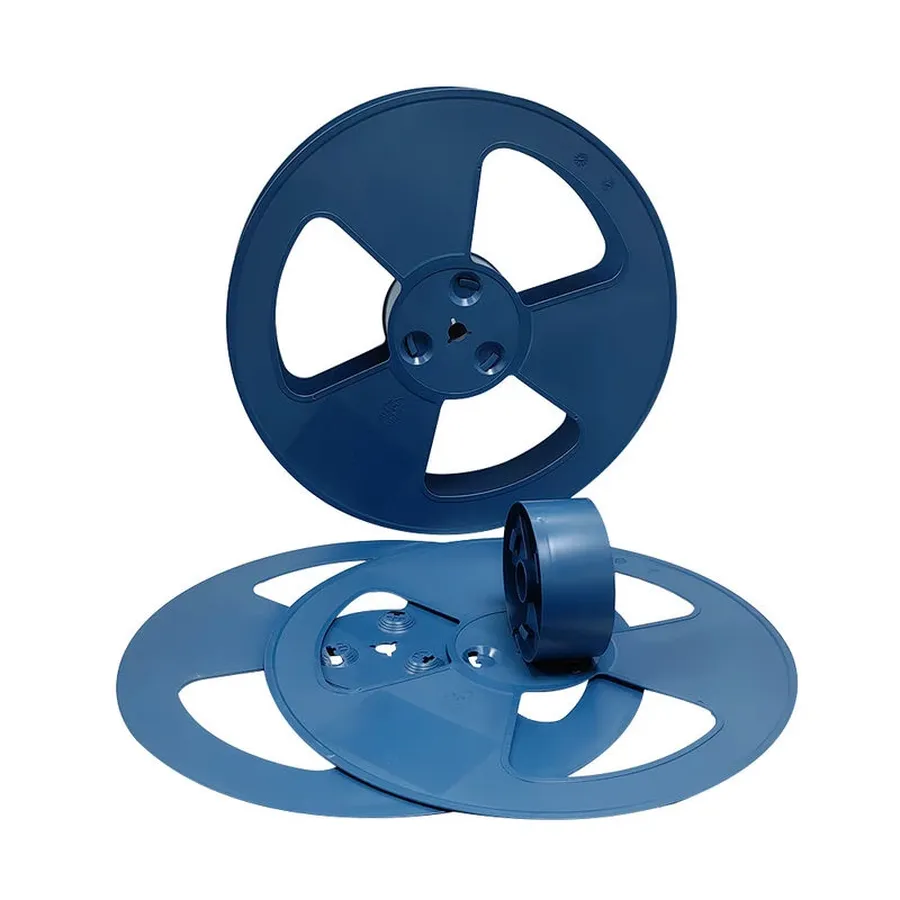 Various reels of packaged electronic components prepared for manufacturing.