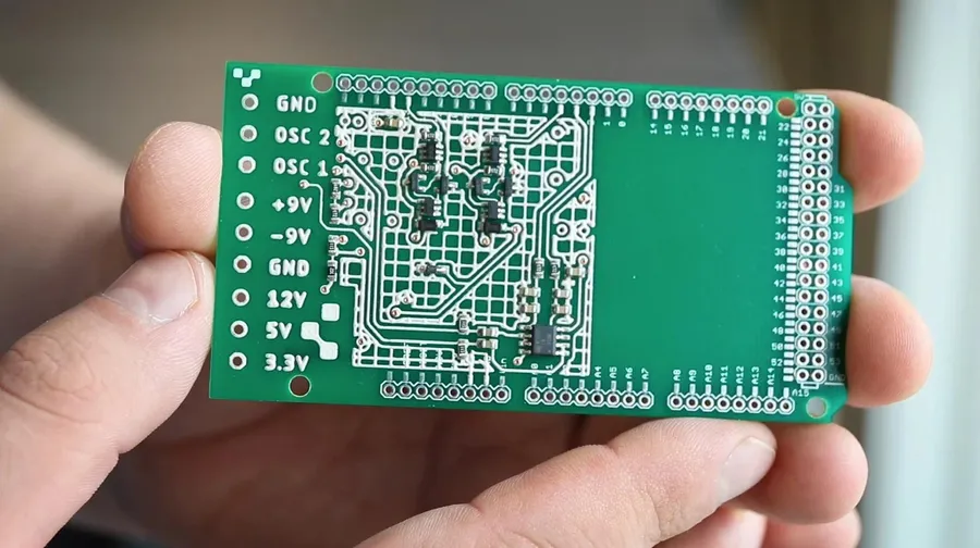 A close-up image of a printed circuit board with various components.