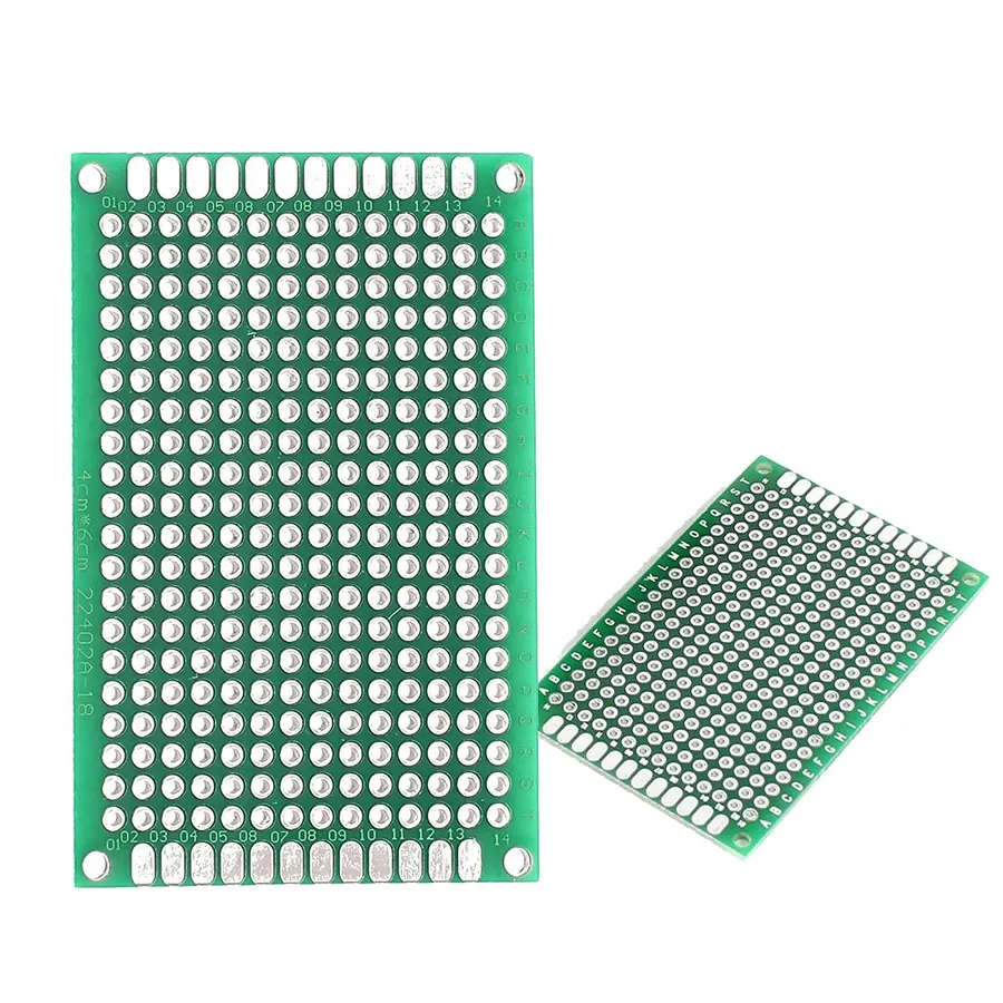 Several PCB prototypes with various components.
