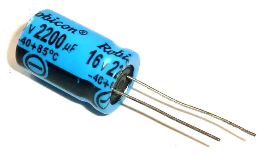 Various capacitors used in an electronic circuit, including a '105' capacitor