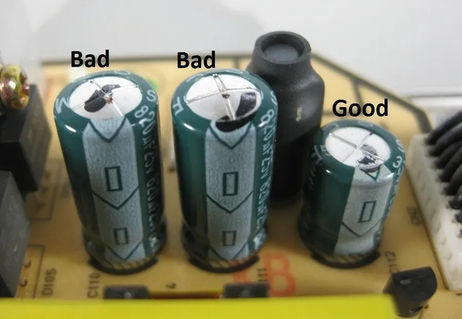 A visibly damaged C65R capacitor showing signs of failure.