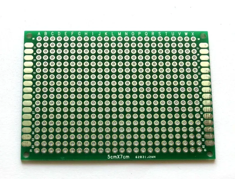 An engineer working on a PCB design prototype