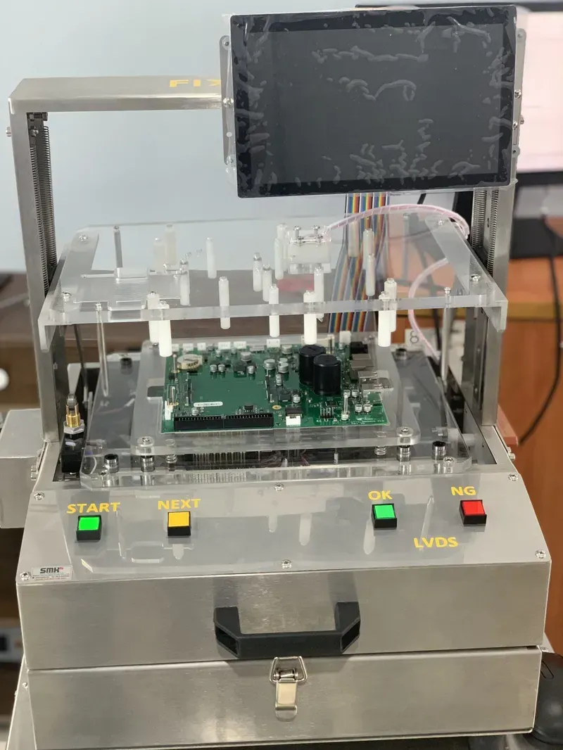 An equipment performing quality testing on a PCB board