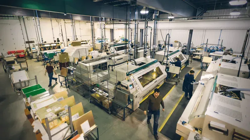 Automated machinery in a PCB manufacturing factory